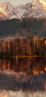 Autumn mountain landscape with reflection in calm water, showcasing serene nature beauty.