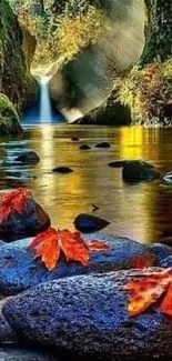 Autumn landscape with waterfall, rocks, and vibrant leaves.