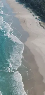 Aerial view of serene beach with waves and shoreline for mobile wallpaper.