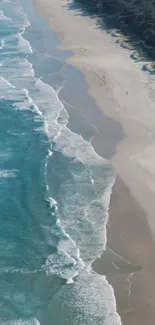 Aerial view of a serene beach with turquoise ocean waves.