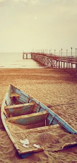 A serene beach scene with an old wooden boat on sunlit sand and a distant pier.