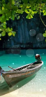 Wooden boat on tranquil turquoise beach with lush green leaves.