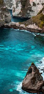 Serene beach cliff with turquoise waters and scenic beauty.