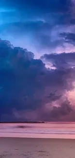 Serene beach at sunset with dramatic clouds.