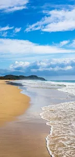 Serene beach wallpaper with blue sky and golden sand.