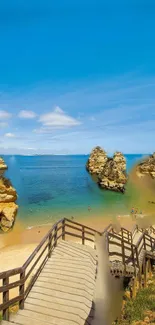 Scenic beach path leading to serene ocean view with clear skies.