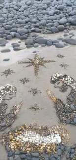 Beach pebble art forming a nativity scene with stones.