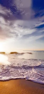 Serene sunset over a beach with waves and vibrant sky.