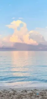 Serene sunrise over calm beach with vibrant blue skies.