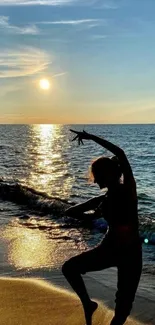 Silhouette dancing on a beach at sunset with ocean reflections.