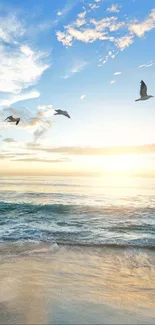 Serene beach sunset with blue skies and seagulls flying over gentle ocean waves.