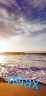 Relaxing beach sunset wallpaper with ocean waves and sandy shore.