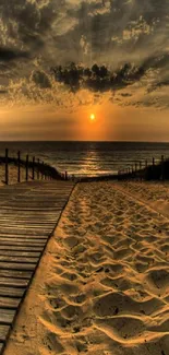 Serene sunset at a beach with golden sand leading to the ocean.