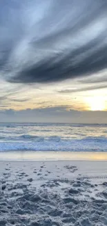 Serene beach sunset with calming ocean waves and a stunning sky.