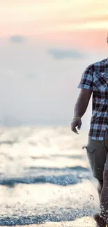 A serene beach walk at sunset with calm ocean waves.