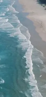 Aerial view of a serene beach with calming waves and sandy shores.