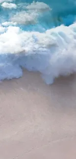 Beach with gentle waves and soft sand under a blue sky.