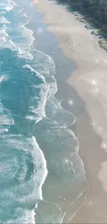 A serene view of turquoise beach waves and sandy coastline.