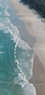 A stunning aerial view of beach waves and sandy shore.