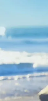 Serene beach wallpaper with gentle waves.