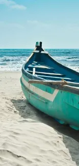 Tranquil beach scene with a blue wooden boat on sandy shore.