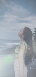 A woman peacefully enjoys the serene beachside view.