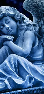 Serene blue angel statue, peaceful and elegant.