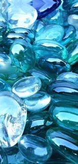 Close-up of blue glass stones forming a calming wallpaper pattern.