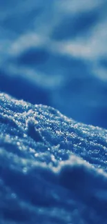 Serene blue textured ice landscape wallpaper.