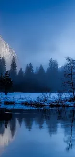 Serene mountain lake with blue tones reflecting the tranquil natural beauty.