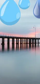 Serene pier at sunset with blue raindrops wallpaper.