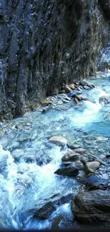 Scenic view of a blue river flowing through a rocky canyon.