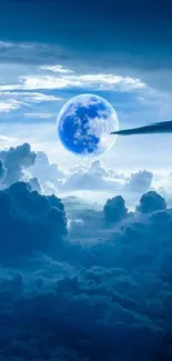 Blue night sky with moon and clouds.