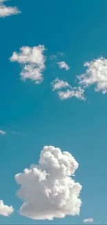 Mobile wallpaper of a sky blue background with fluffy white clouds.