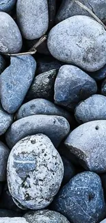 Serene blue stones with natural texture for mobile wallpaper.