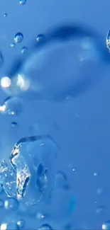 Close-up of blue water droplets on a phone wallpaper for a calming effect.