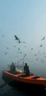 Orange boat surrounded by birds on misty waters.