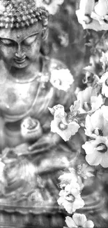 Grayscale Buddha statue with floral design on mobile wallpaper.