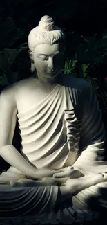 Serene white Buddha statue in meditation surrounded by nature.