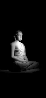 Serene Buddha statue on black background