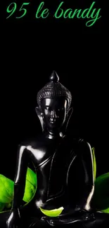 Serene Buddha statue with green leaves on a black background.