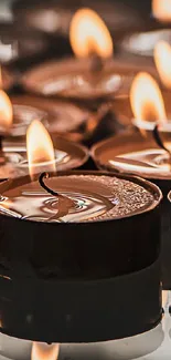 Elegant burning candles creating a serene glow.