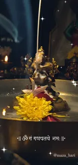 Peaceful Ganesha idol with candlelight and flowers in a tranquil setting.