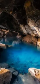 Serene blue pool inside a rocky cave.