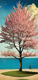 Cherry blossom tree on a serene beach with a blue sky.