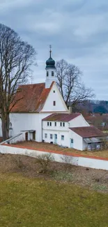 A picturesque church set in the tranquil countryside.