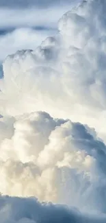 Serene cloudy sky mobile wallpaper with fluffy white clouds.