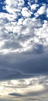 Serene cloudy sky with soft light and shades of blue.