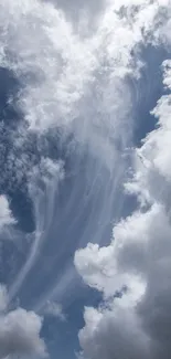 Serene cloudy sky with blue hues and wispy clouds.