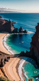 Scenic view of cliffs and turquoise beach shoreline at coast.